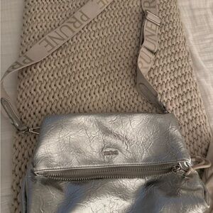 Prune Metallic Silver Crossbody with Branded Strap